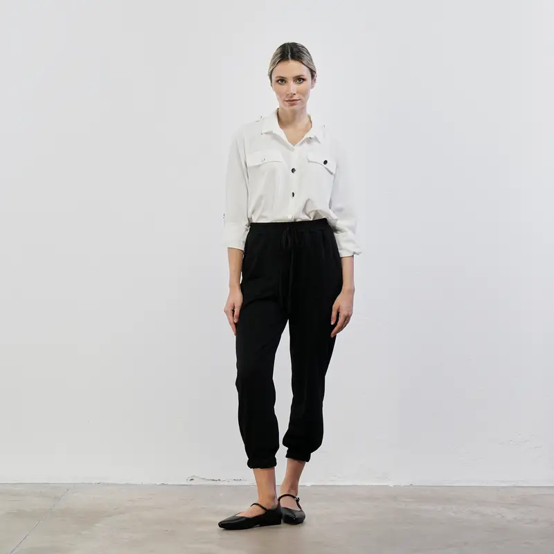 Pantaloni neri con polsini