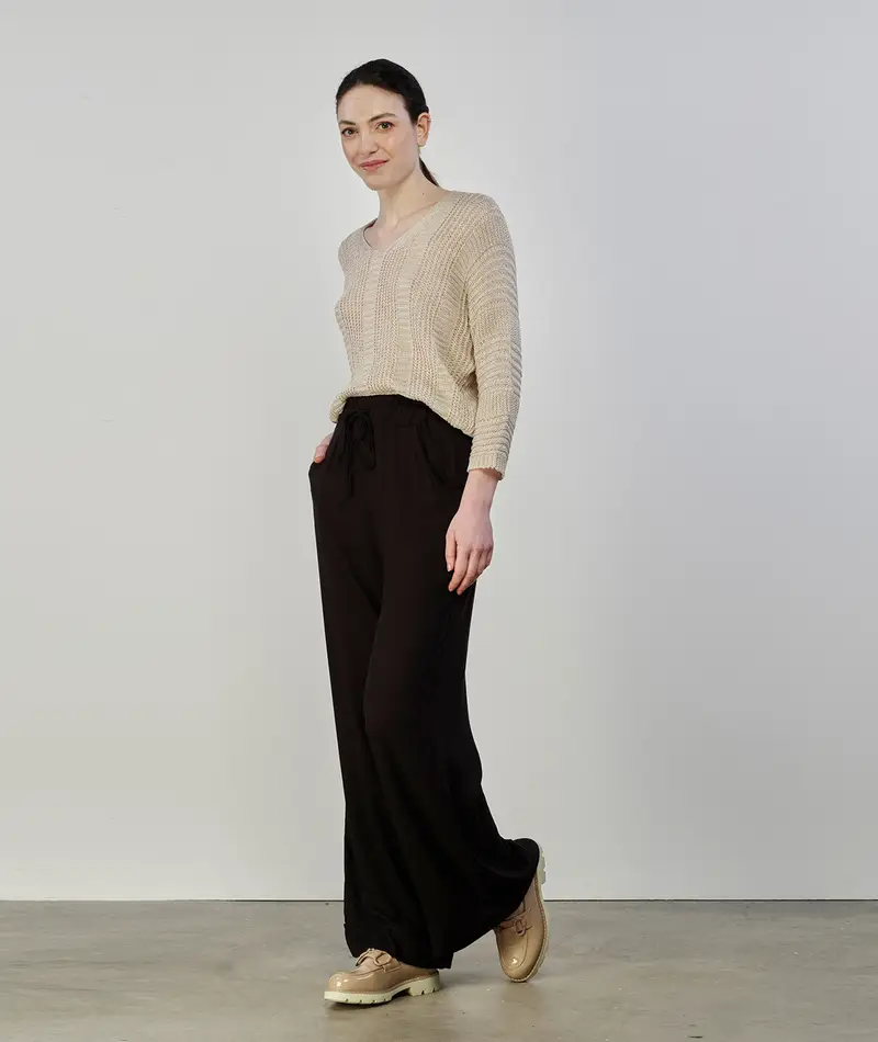 Pantaloni neri con risvolto e coulisse