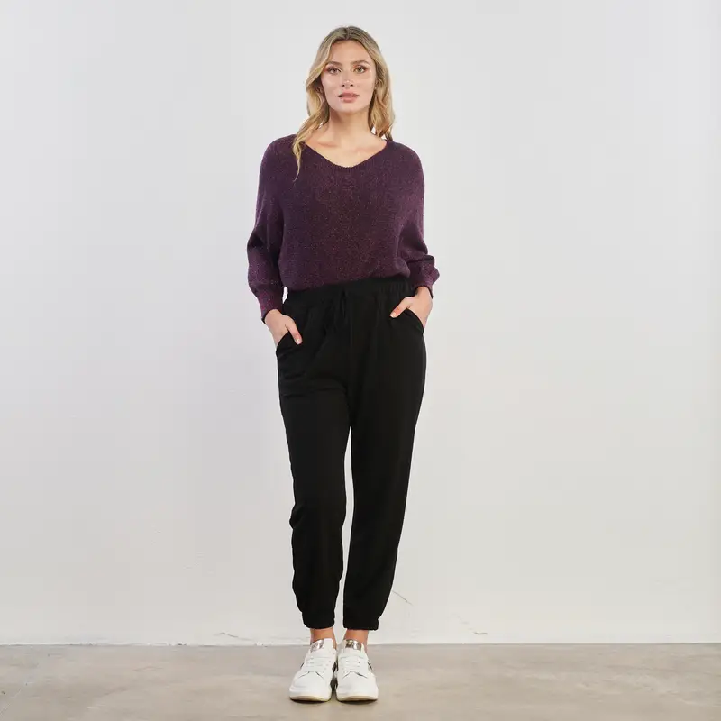 Pantaloni neri con tasche e elastico alla caviglia