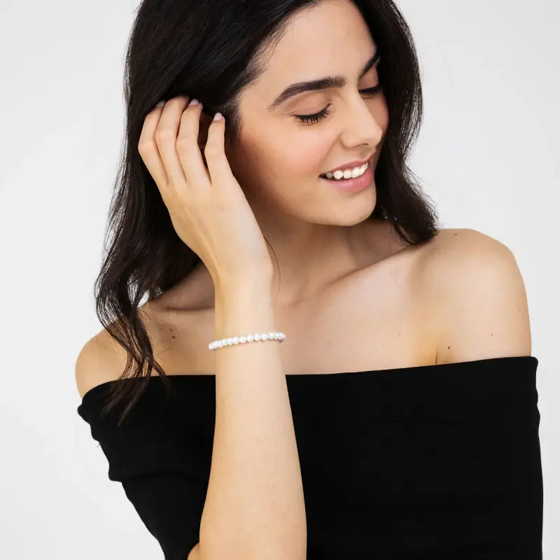 BRACCIALE DI PERLE SINTETICHE BIANCHE DONNA miniatura 3