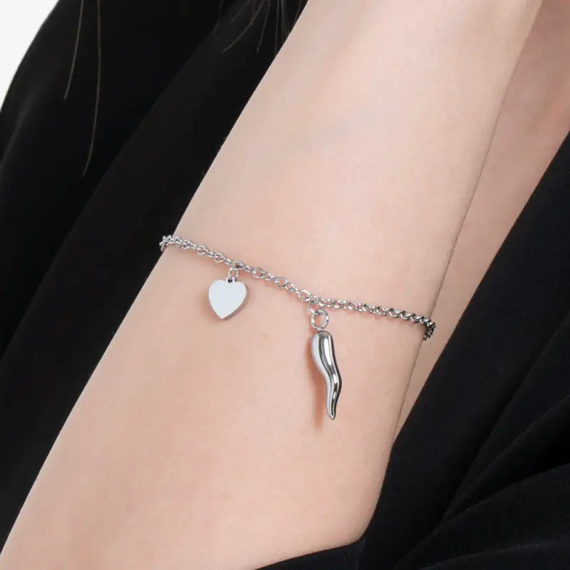 BRACCIALE DONNA IN ACCIAIO CON CUORE E CORNO miniatura 2