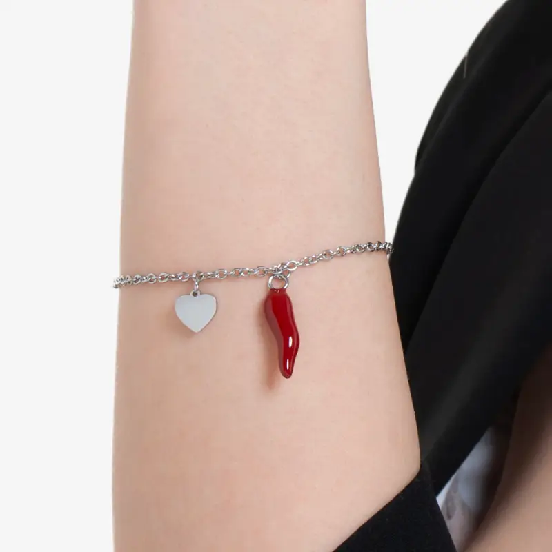 BRACCIALE DONNA IN ACCIAIO CON CUORE E CORNO ROSSO miniatura 2