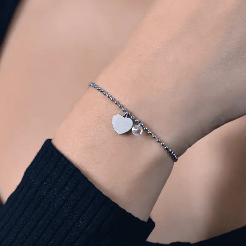 BRACCIALE DONNA IN ACCIAIO CON CUORE E ZIRCONE BIANCO miniatura 2