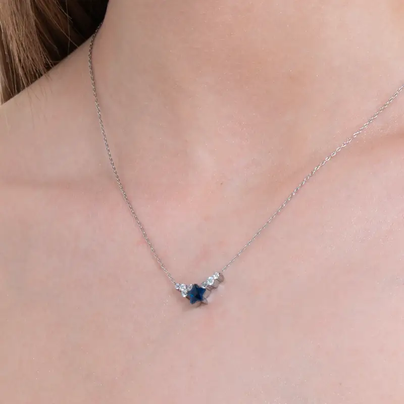 COLLANA DONNA IN ACCIAIO CON STELLA BLU E CRISTALLI BIANCHI miniatura 2