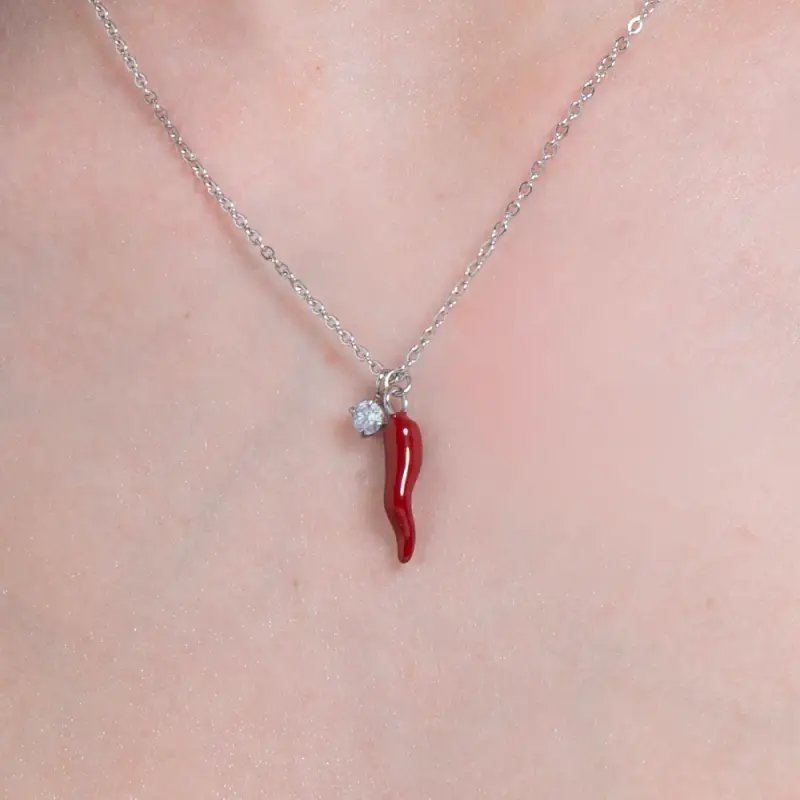 COLLANA IN ACCIAIO CON CORNO ROSSO E PUNTO LUCE miniatura 2