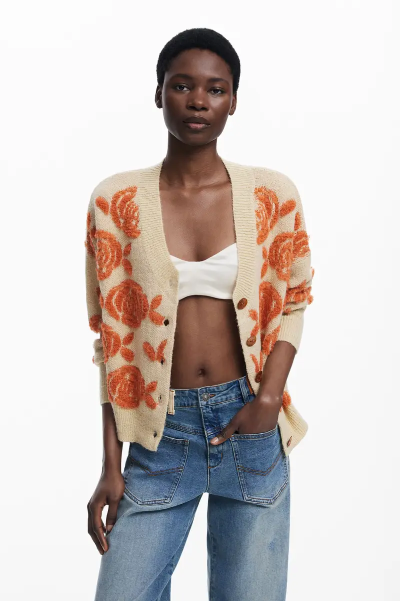 Maglione con bottoni rosa