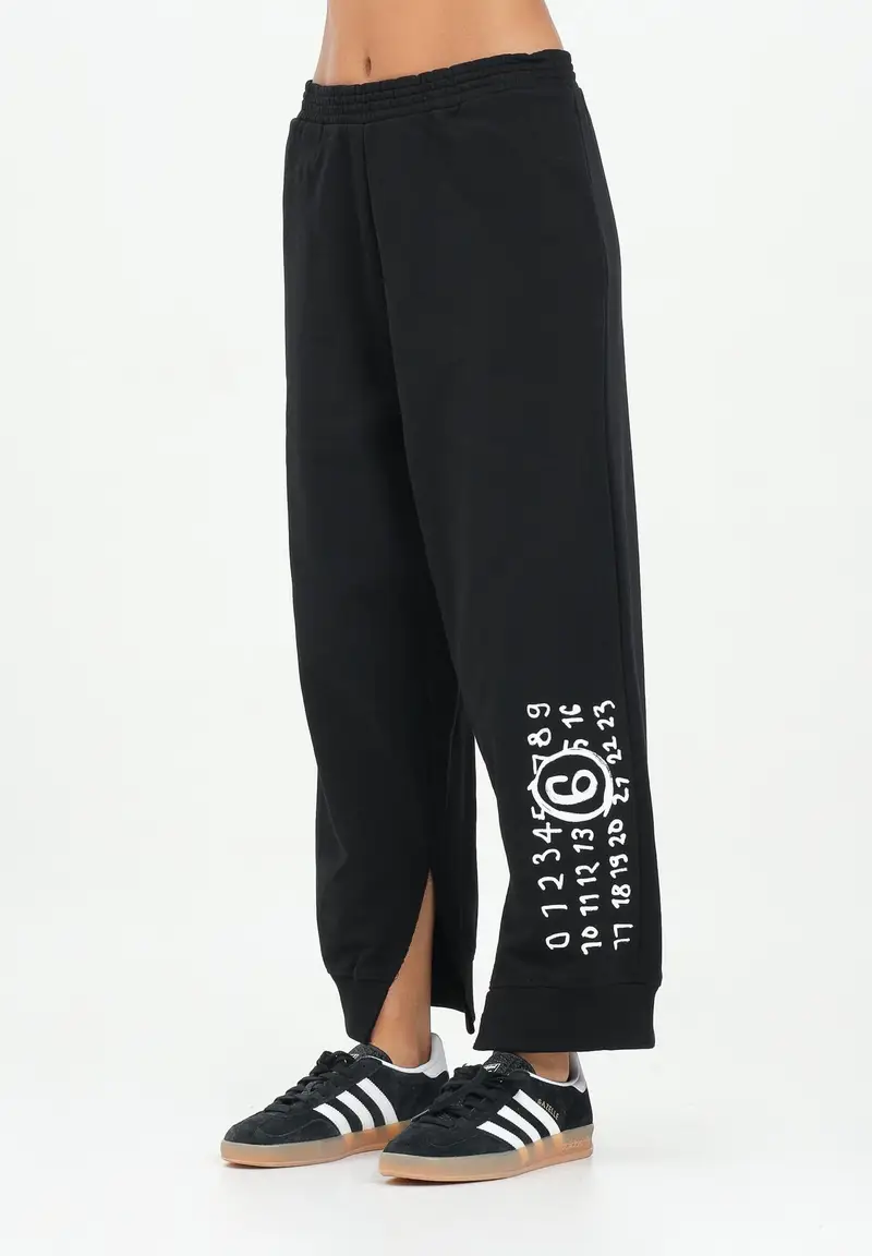 Pantalone sportivo nero per donna, ragazzi e bambini con spacchetti interni alla caviglia