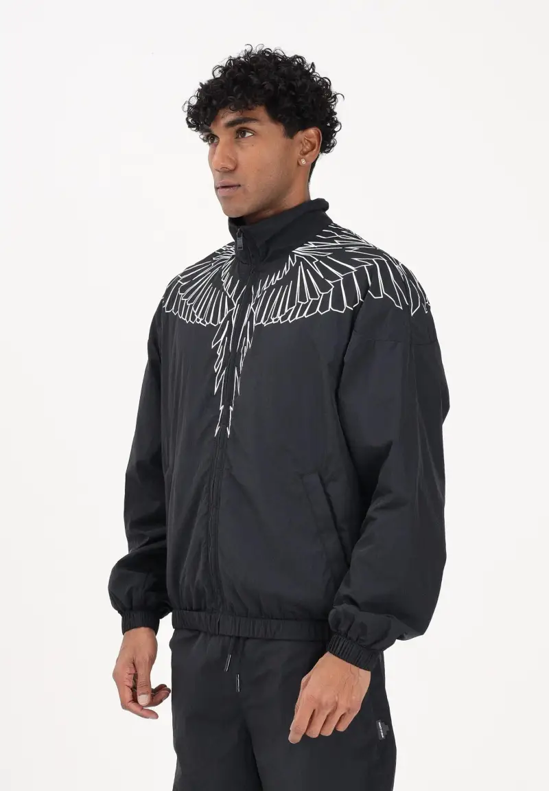 Giacca a vento nera da uomo con grafica ali