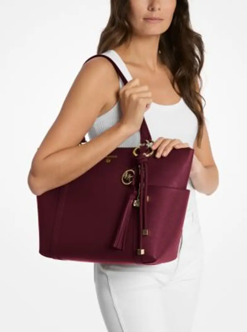 MK Ciondolo da borsa in tonalità oro con cordoncino - Viola - Michael Kors miniatura 2