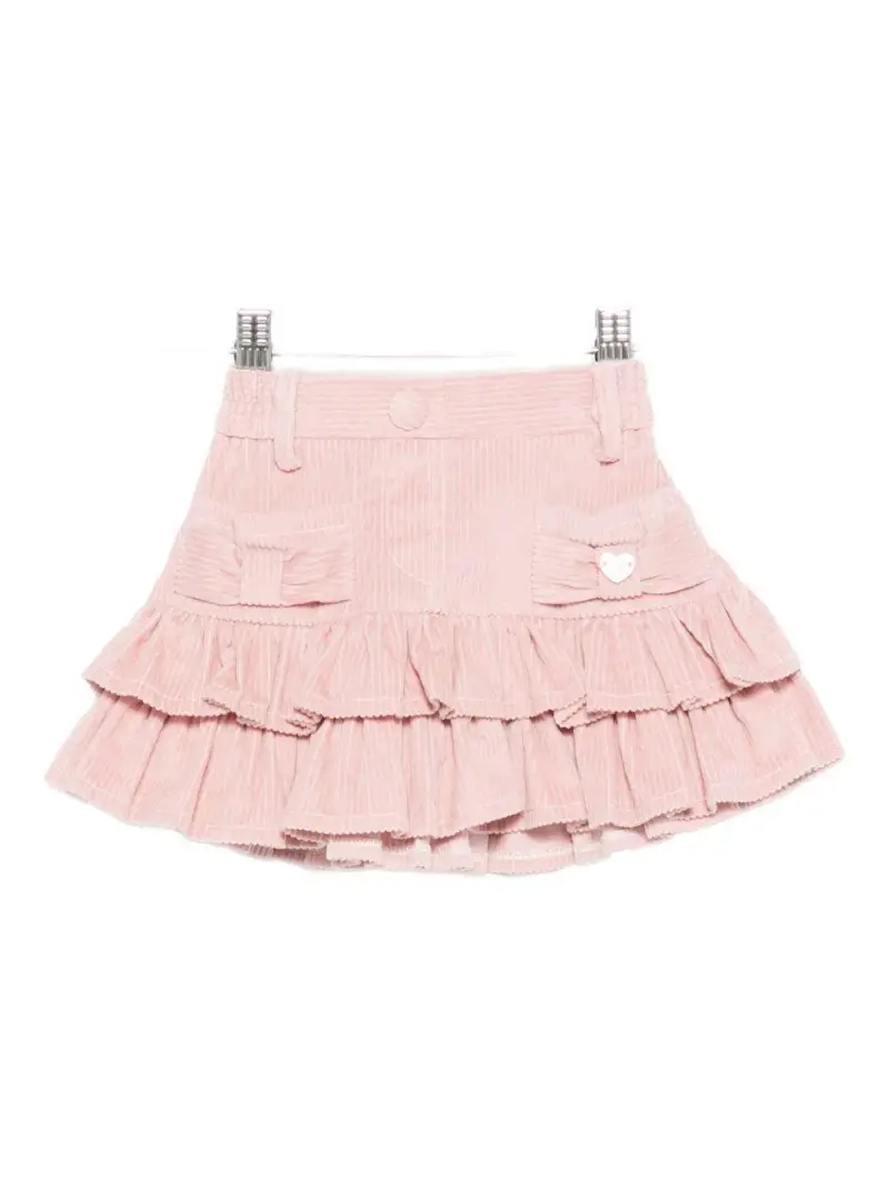 Gonna rosa a coste con tasche frontali