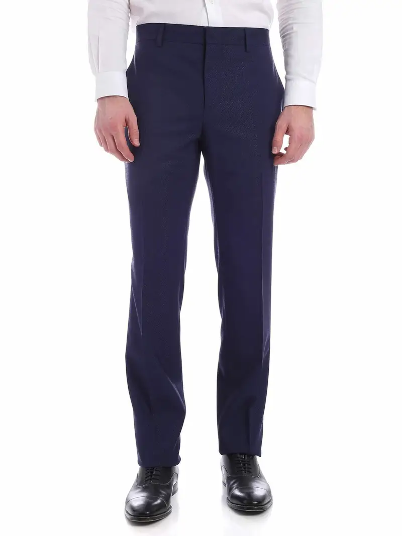 Pantalone blu con micro motivo tono su tono