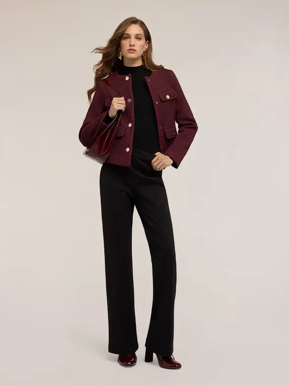 Pantaloni flare con motivo occhielli Donna, Nero