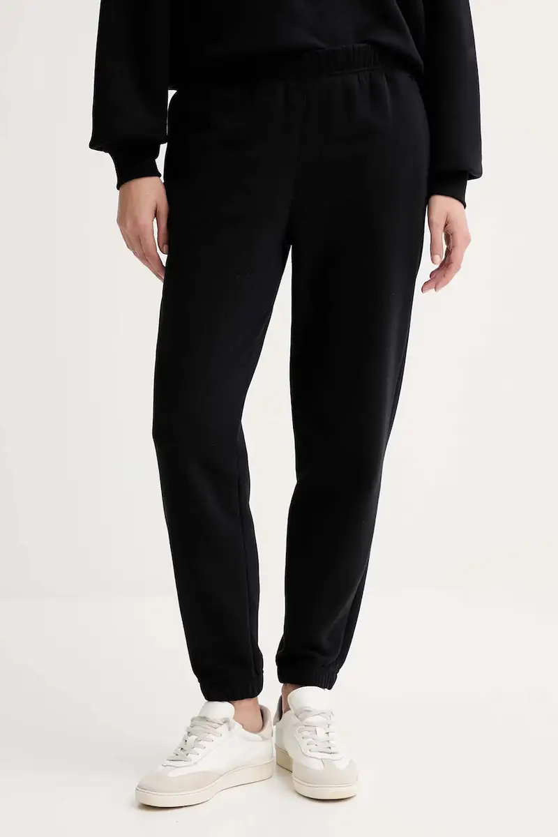 . pantaloni tuta MUUV. x Answear donna colore nero