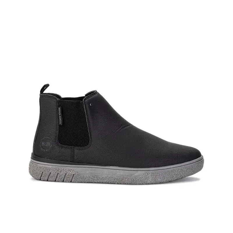 Stivaletti neri modello chelsea con suola a contrasto