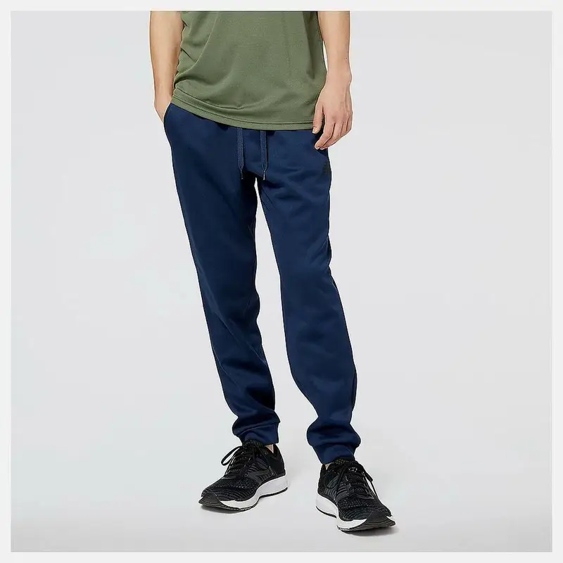 Pantalone per Adulti New Balance TNCT FLC PNT MP23022 NGO Blu Marino | New Balance Blu navy