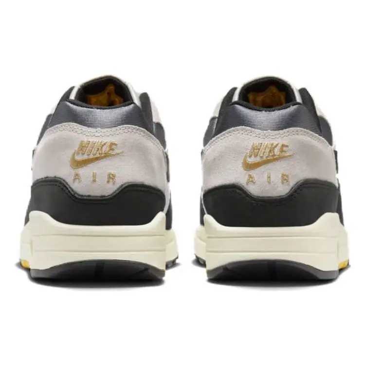Air Max 1 Dipartimento Atletico - Light Bone University Gold Sneakers Unisex Crema FN7487-133 37 5 miniatura 2