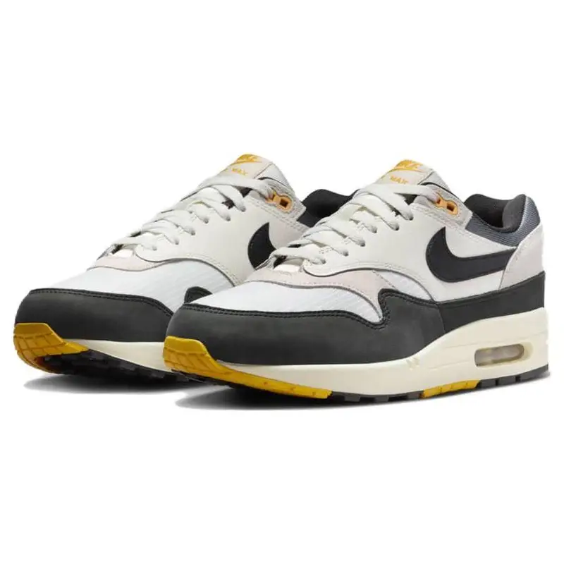 Air Max 1 Dipartimento Atletico - Light Bone University Gold Sneakers Unisex Crema FN7487-133 40 miniatura 5