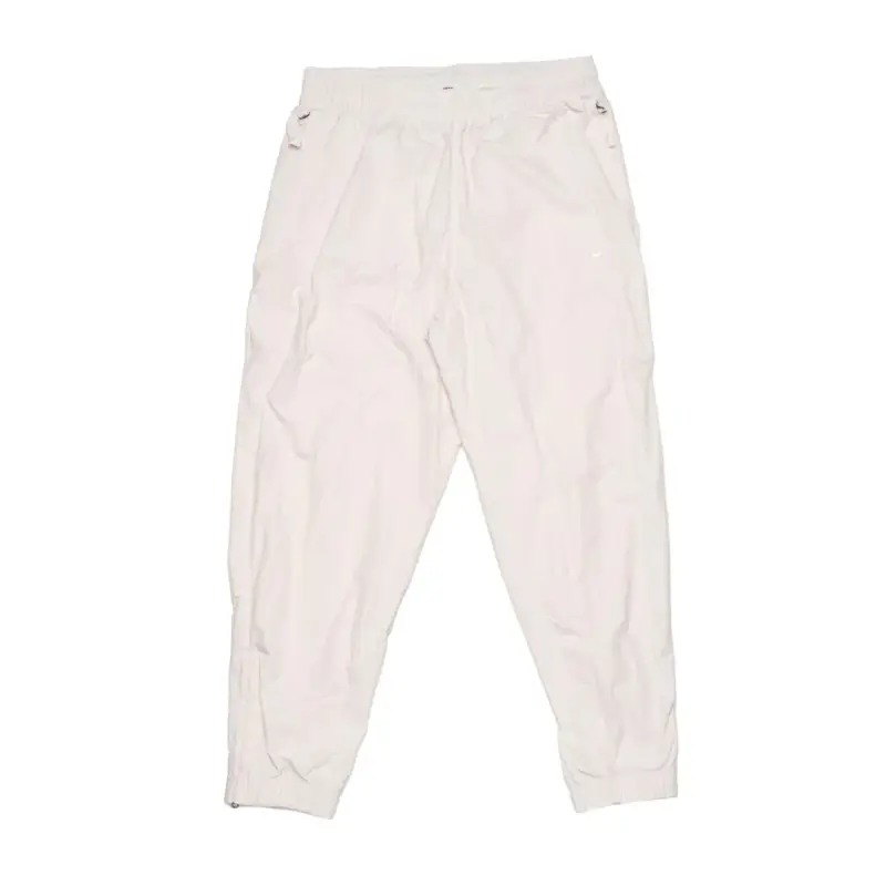 DQ6571-030 Pantaloni Sportswear Solo Swoosh Phantom - XS