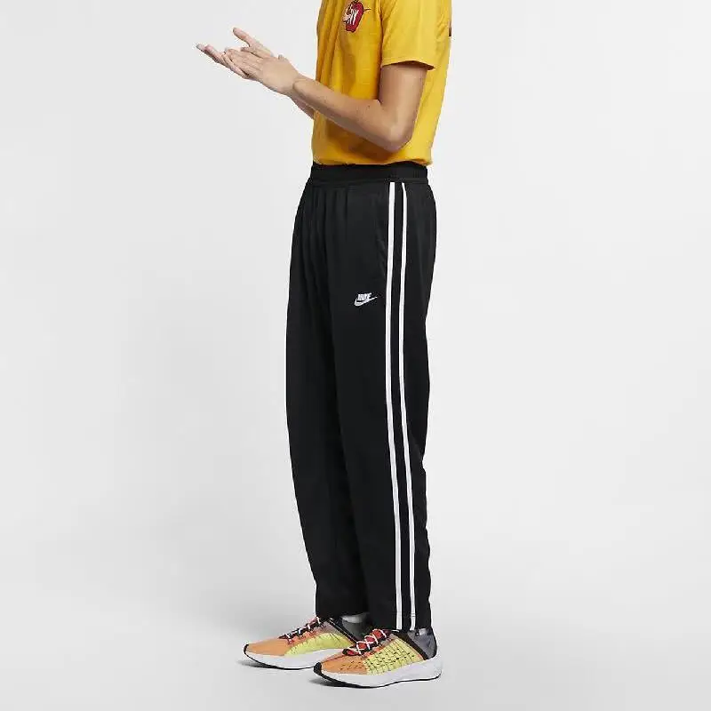 Joggers in maglia con zip alla caviglia e striscia laterale Nike Uomo Pantaloni Nero AR2247-010 XL miniatura 2