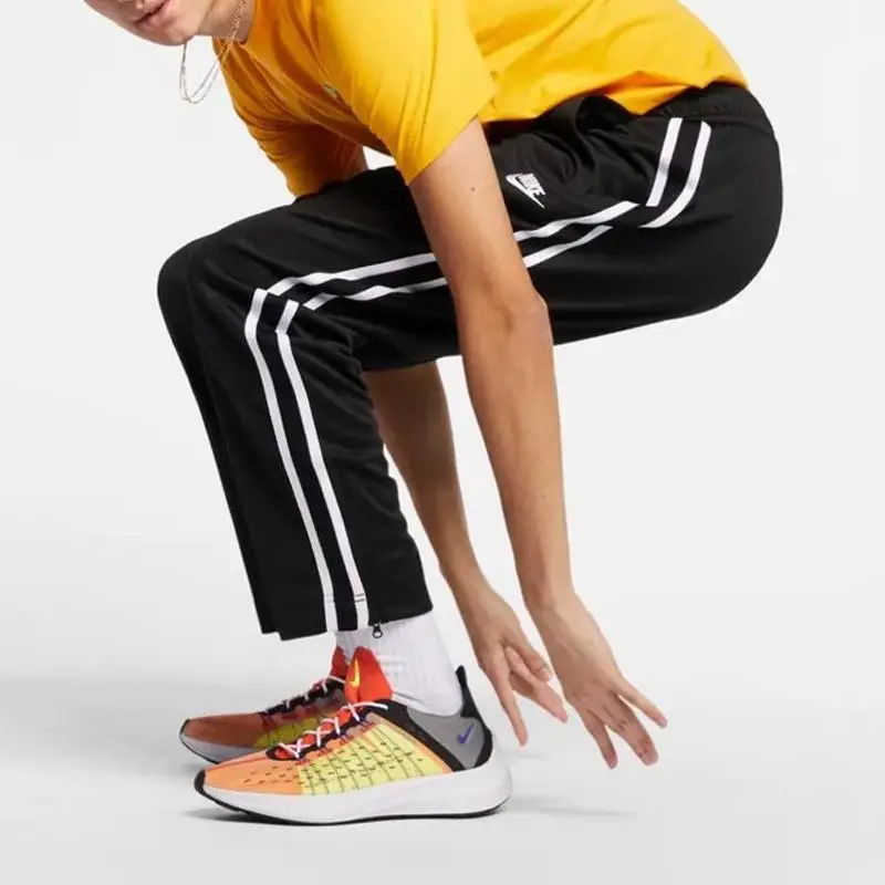 Joggers in maglia con zip alla caviglia e striscia laterale Nike Uomo Pantaloni Nero AR2247-010 XL miniatura 5