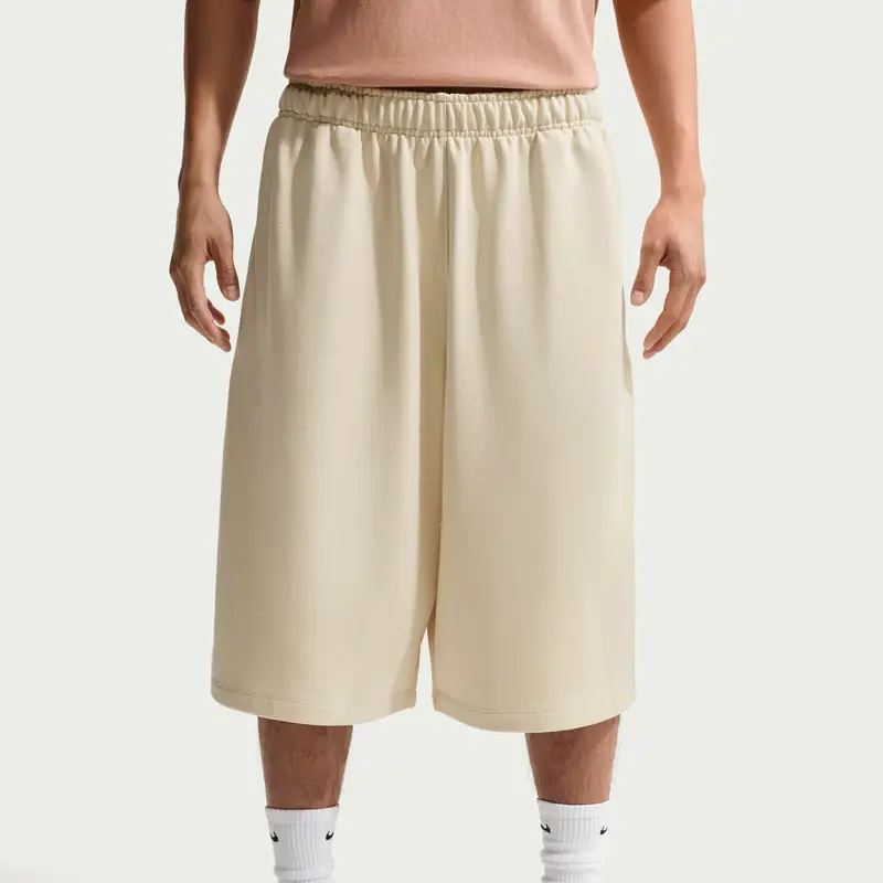 Pantaloni corti in felpa oversize Nike Club Vert