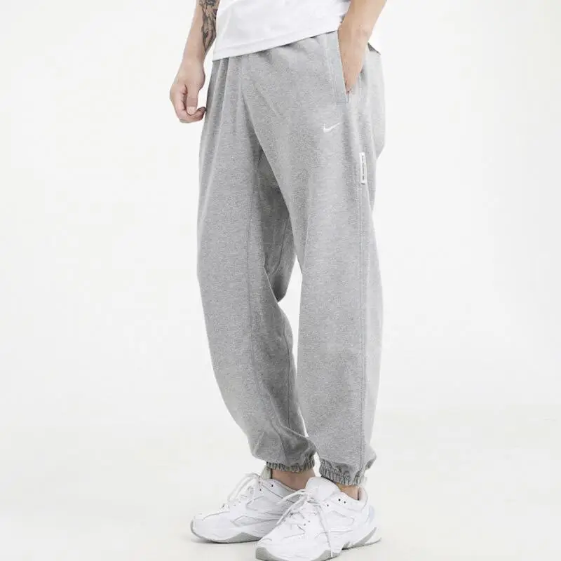 Pantaloni da basket lunghi da uomo Nike Standard Issue con elastico in vita ad asciugatura rapida Grigio CK6366-063 XL miniatura 3