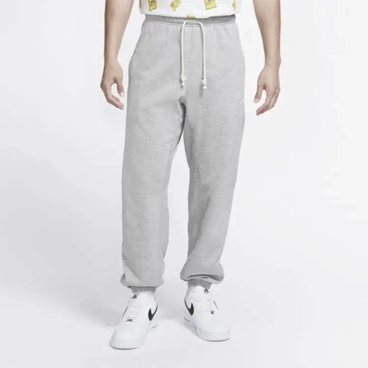 Pantaloni da basket lunghi da uomo Nike Standard Issue con elastico in vita ad asciugatura rapida Grigio CK6366-063 XS miniatura 5