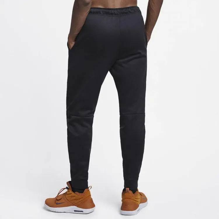 Pantaloni da jogging da allenamento affusolati Nike Therma da uomo, foderati in pile, neri 932256-010 M miniatura 2