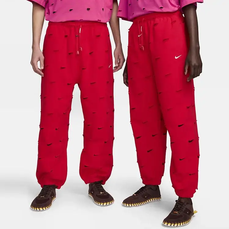Pantaloni da jogging unisex Nike X Jacquemus SS24 monocolore traforati con coulisse e fodera in pile spesso Rosso Università FJ3269-657 M miniatura 2