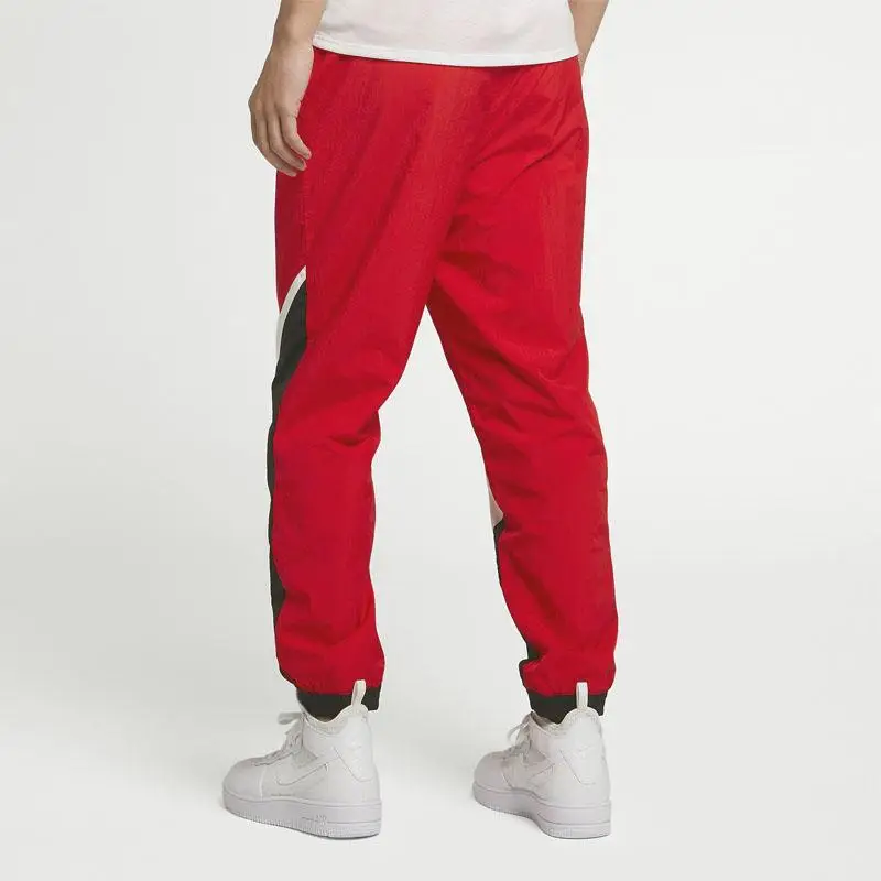 Nike Pantaloni da tuta lunghi larghi in maglia rossi con design miniatura 5