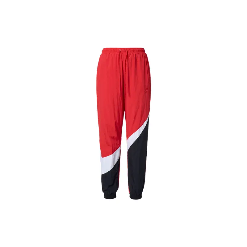 Nike Pantaloni da tuta lunghi larghi in maglia rossi con design