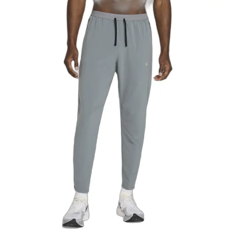 Pantaloni fitness da ginnastica Nike Stride Gris