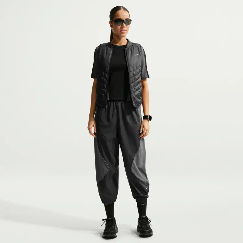Pantaloni impermeabili da donna Nike Swift Noir
