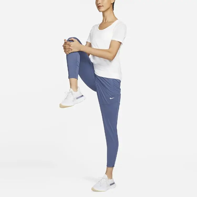 Pantaloni Sportivi da Donna Nike Dri-FIT Essential Tinta Unita con Logo Asciugatura Rapida Lavorati a Maglia Fondi Blu Finn DX1046-491 M miniatura 2