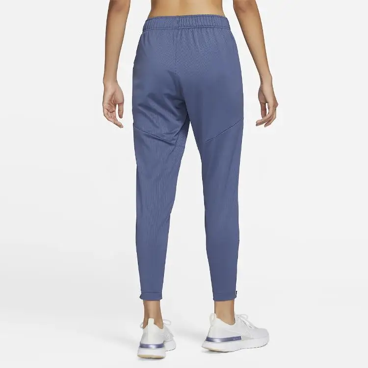 Pantaloni Sportivi da Donna Nike Dri-FIT Essential Tinta Unita con Logo Asciugatura Rapida Lavorati a Maglia Fondi Blu Finn DX1046-491 M miniatura 5