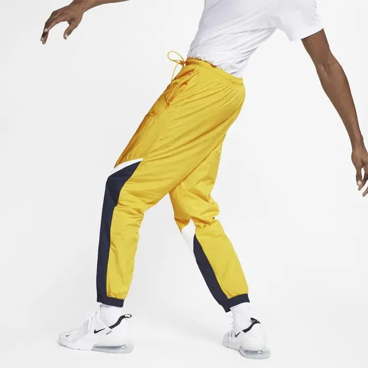 Pantaloni Sportivi Uomo Nike Retro Intrecciati Spliced Giallo AR9895-728 XXL miniatura 3