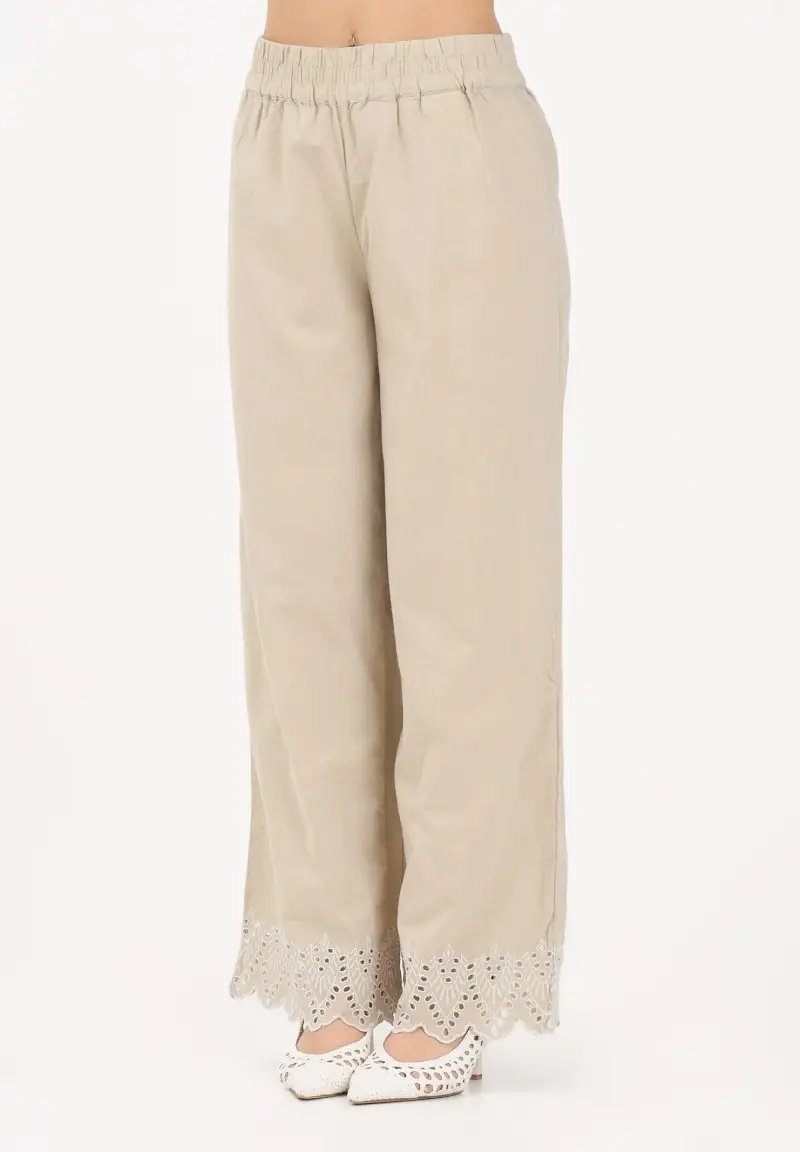 Pantalone beige da donna con fondo ricamato