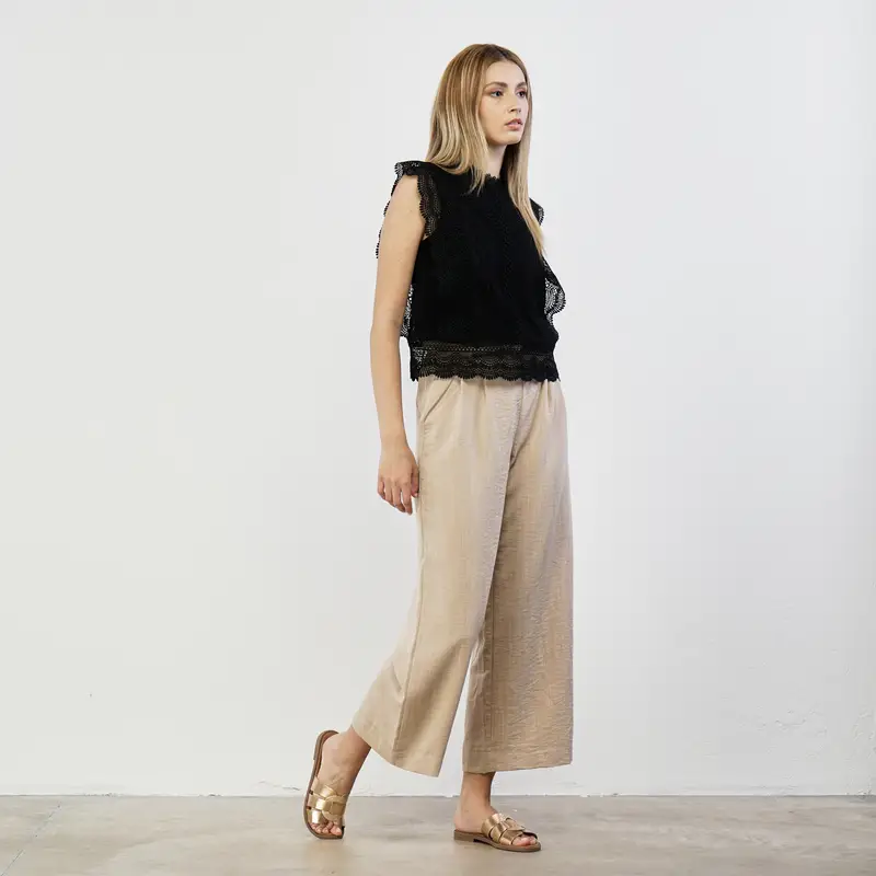 Pantaloni lunghi beige con fusciacca in vita