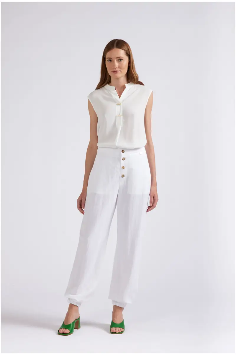 pantaloni con bottoni a vista ed elastico alla caviglia bianco