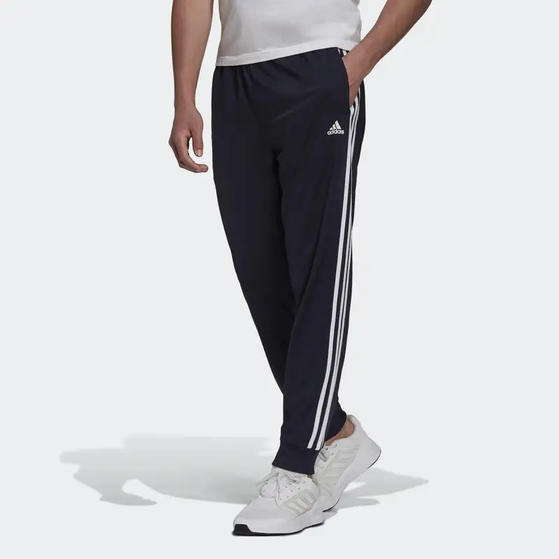 Pantaloni da allenamento Primegreen Essentials Warm-Up Tapered 3-Stripes |  Adidas