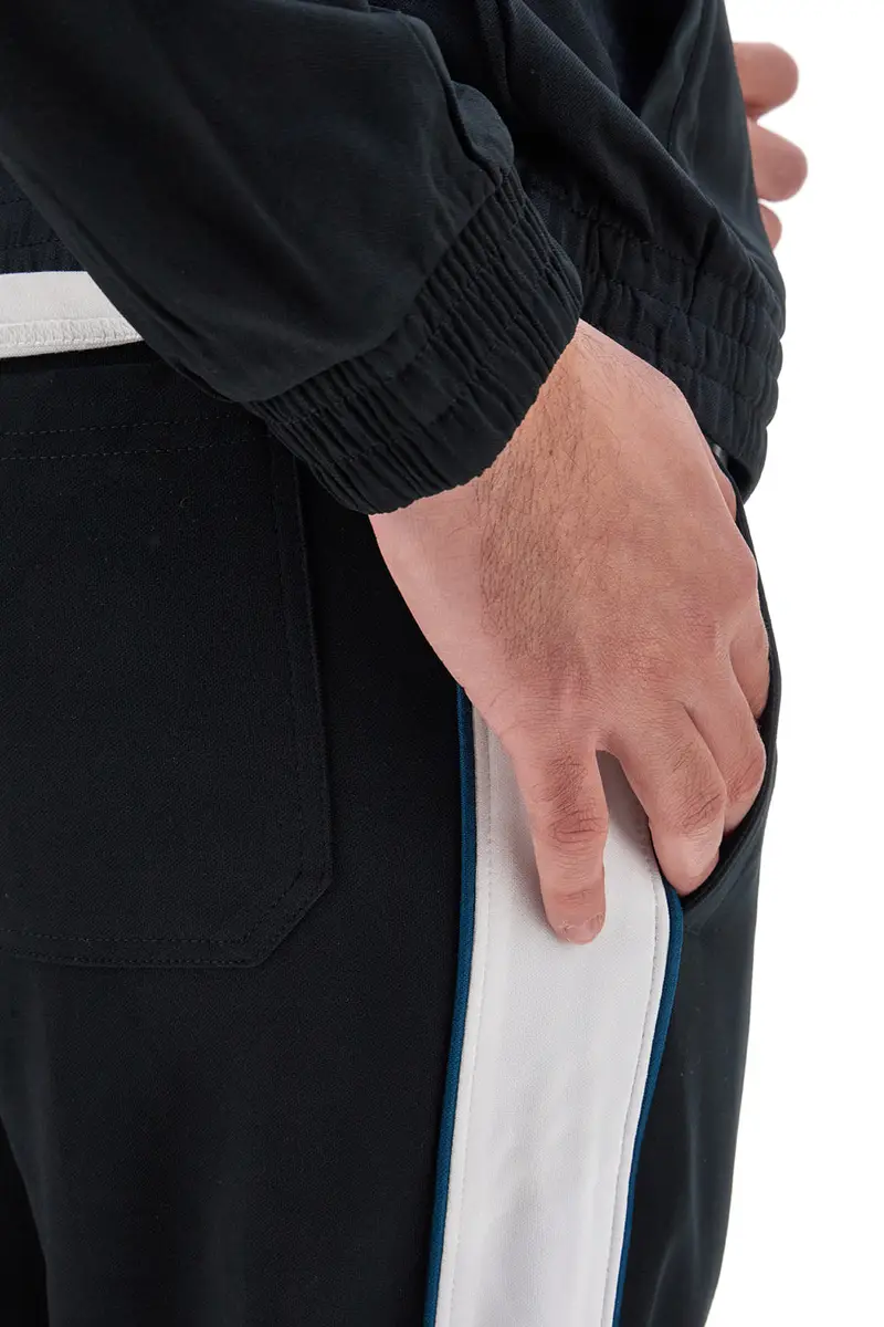 Pantaloni Neri Con Fasce Laterali Bianche SKECHERS Premier Track Pant miniatura 2