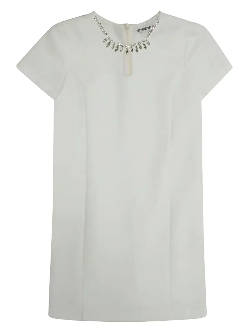 abito junior in tessuto bianco con pietre sul collo