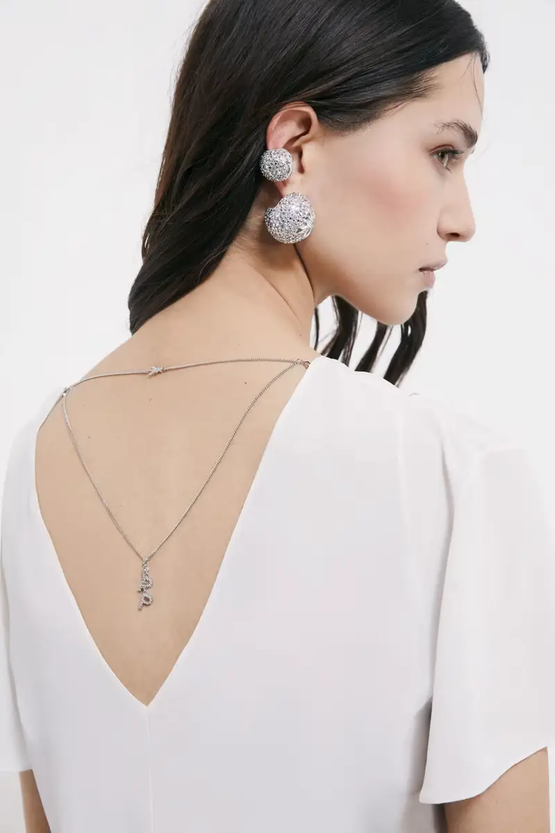 Blusa con dettaglio gioiello Bianco