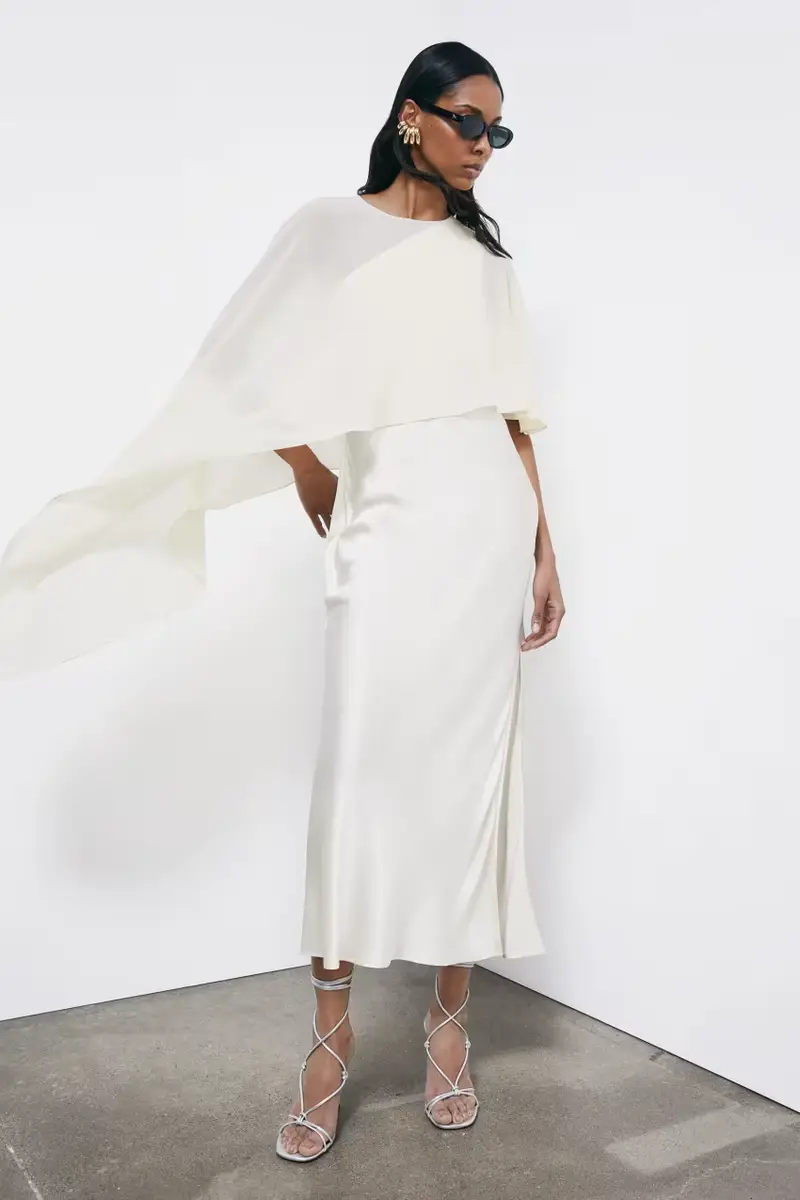 Coprispalle asimmetrico drappeggiato Bianco