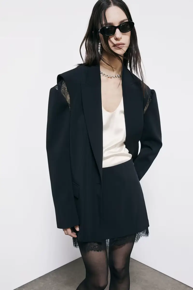 Minigonna in crêpe con pizzo Nero