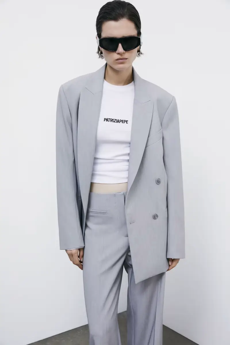 Top a maniche lunghe in costina con logo Bianco