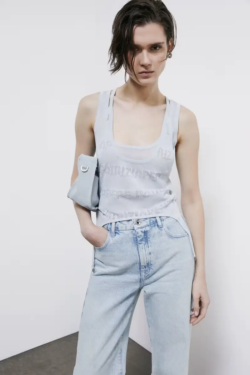 Top in maglia con logo traforato Azzurro