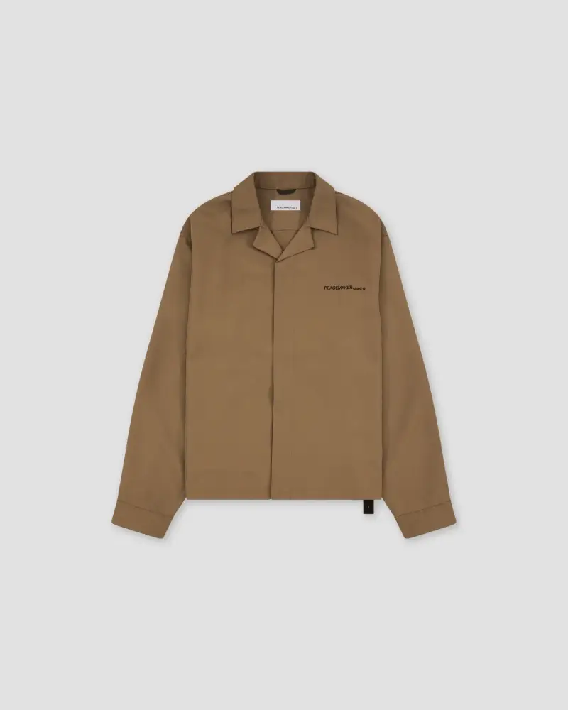 Peacemaker Maglia beige con logo e stampa sul retro