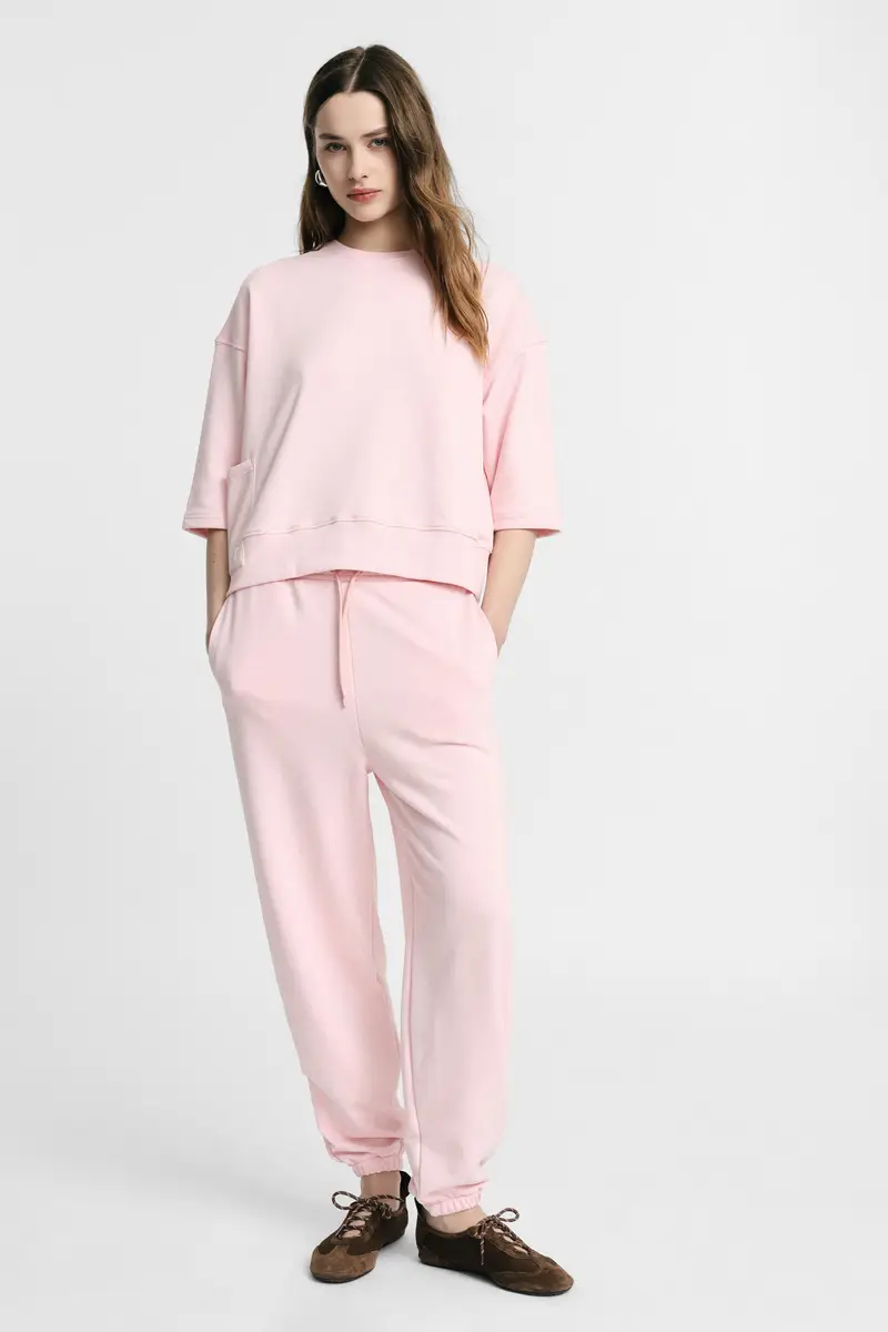 Trousers jogging fit con fondo elasticizzato Rosa miniatura 4
