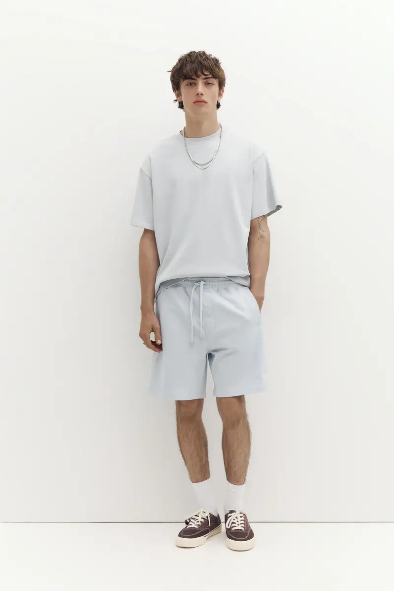 Bermuda Jogger Con Logo Celeste